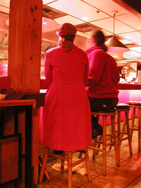 The red couple at red counter (Next: Noomin)